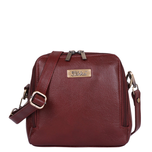 Sishka Cherry Red Leather Crossbody Handbag – Zipper Closure, Premium Sling Bag, Lightweight Purse with Tassel, Genuine Leather Shoulder Bag for Women, Ideal for Travel, Shopping & Daily Use.