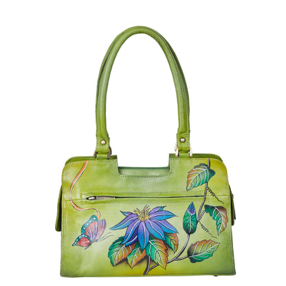 Emerald green floral design hand-painted on a stylish leather bag
